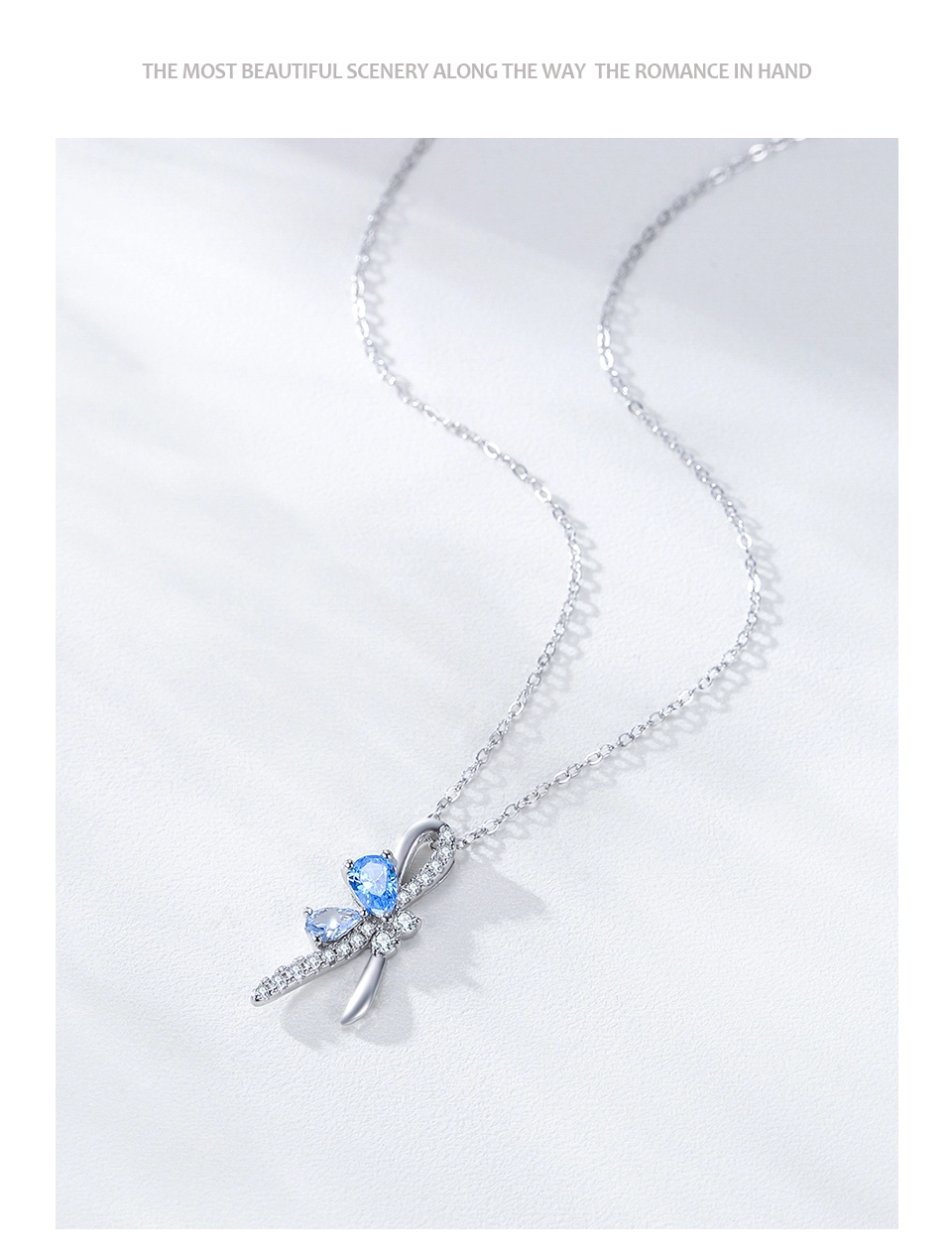 Bow Pendant Necklace Blue Water Droplet Zircon Sterling Silver